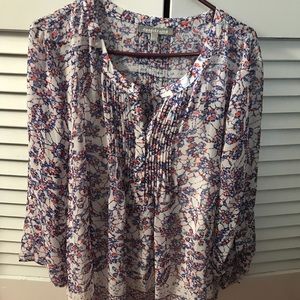 Sheer women’s blouse with white camisole